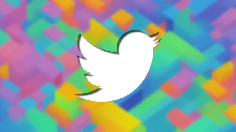 Un logotipo de Twitter en forma de recorte en un rompecabezas como fondo.